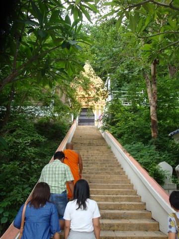 We followed the monk up some steps to a cave entrance.