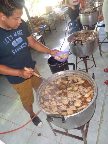 The chefs for the day set up the big cookers