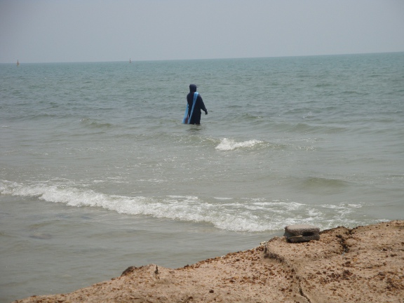 fishermen throwing and retrieving their nets