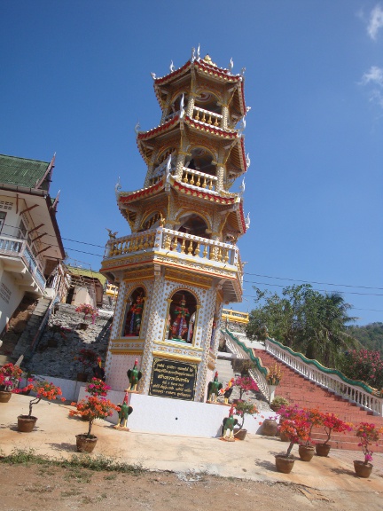 an ornately decorated Chinese Temple type of tower
