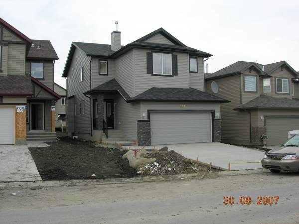 The new house, yard work <br />needed!
