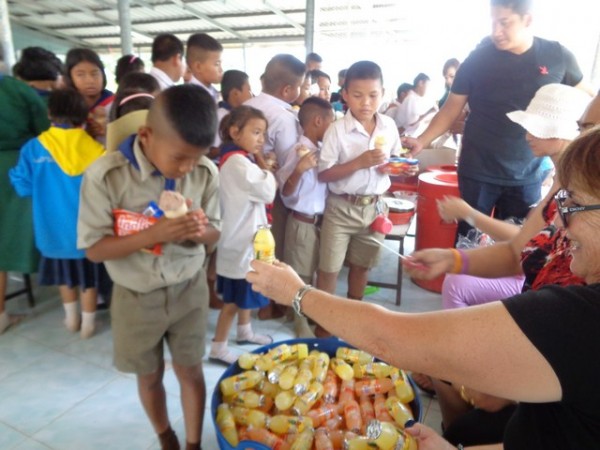 the older kids now queued up for treats.