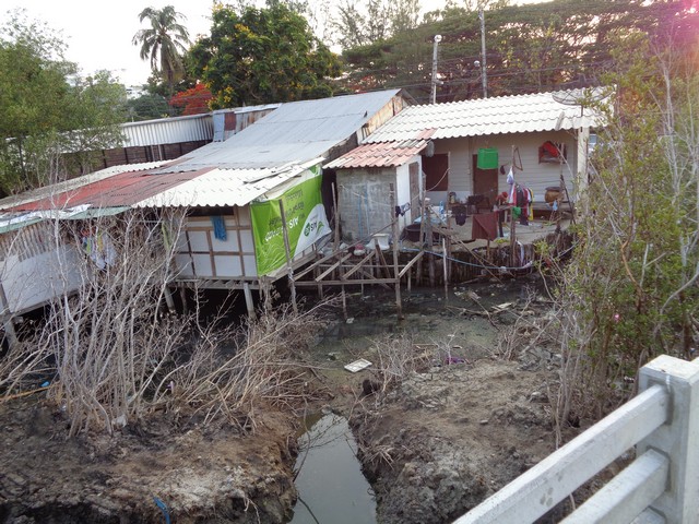 the rear of the many roadside bars and restaurants