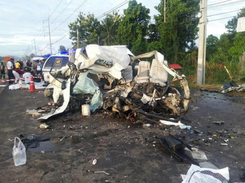 A passenger van destroyed after a collision with a lorry in Wang Sombun district of Sa Kaeo province on Sunday. Sawat Ketngam