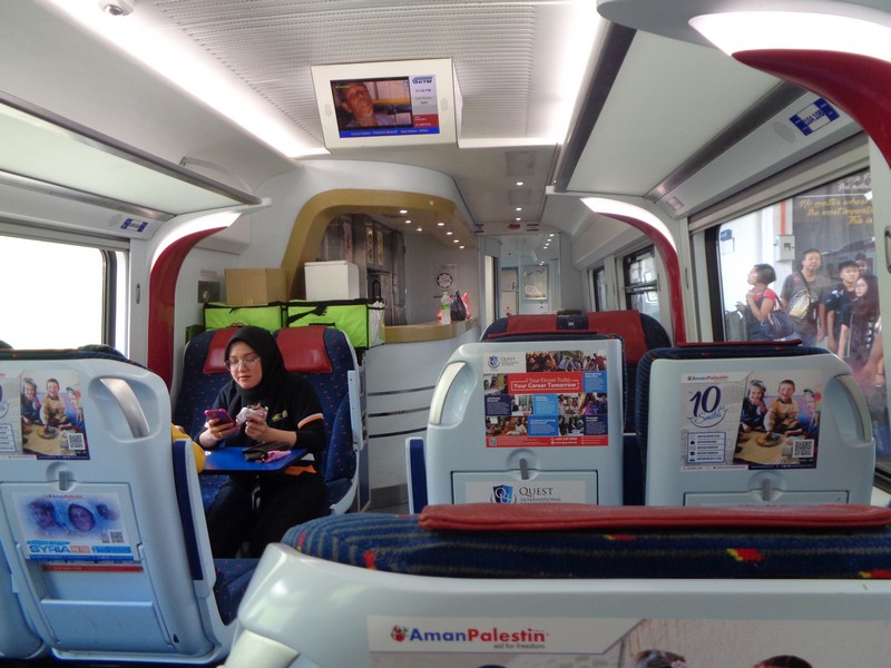 A funny story with this photo.  The 2 sat down are the snack bar operators. We got on the train before it was ready to board.  The doors locked behind us, and they couldn't get us off - we were told to sit down.  Other disgruntled passengers started knocking at the door.