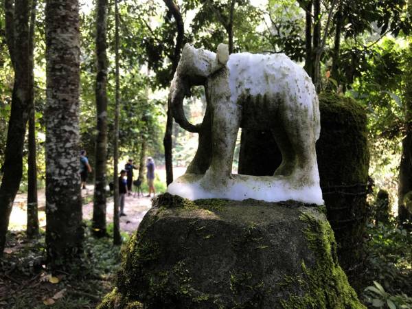 Cement barriers with an elephant statue were erected in 1992 to prevent jumbos from taking a dangerous Haew Narok route in Khao Yai National Park. Pattanapong Hirunard