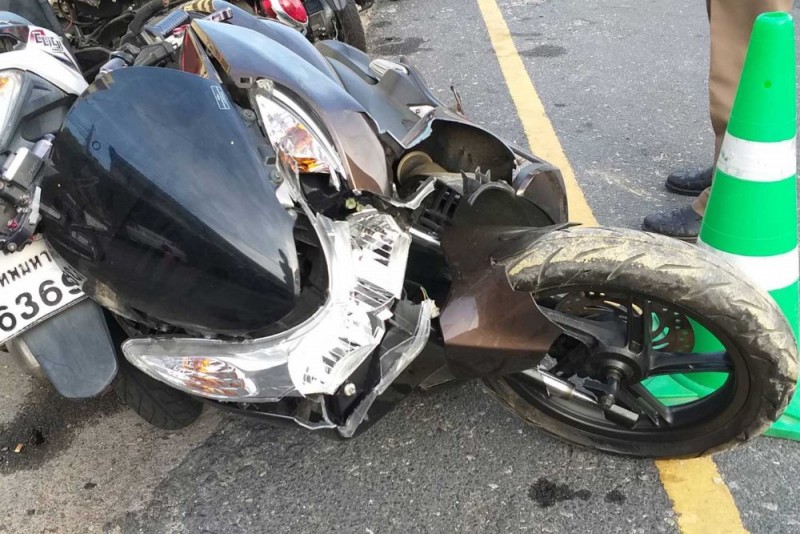 The motorcycle ridden by the Frenchman was severely damaged when hit by the ATV. (Photo by Achadtaya Chuenniran)