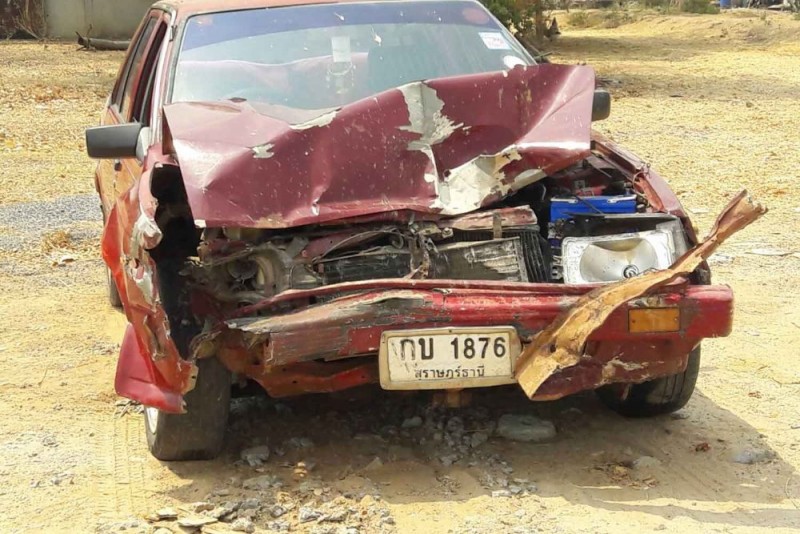 The Nissan Sunny, driven by a monk, after it rear-ended a pickup in Phimai on Sunday. A woman travelling on the back of the pickup was killed. (Photo by Prasit Tangprasert)