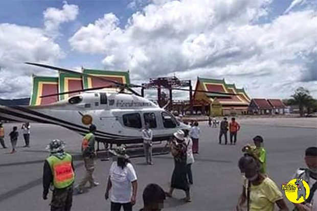 A Bell 419 of the Royal Thai Police Office lands at Wat Chedi in Sichol district of Nakhon Si Thammarat province on Friday. (Photo from @Watchdog.ACT Facebook account)