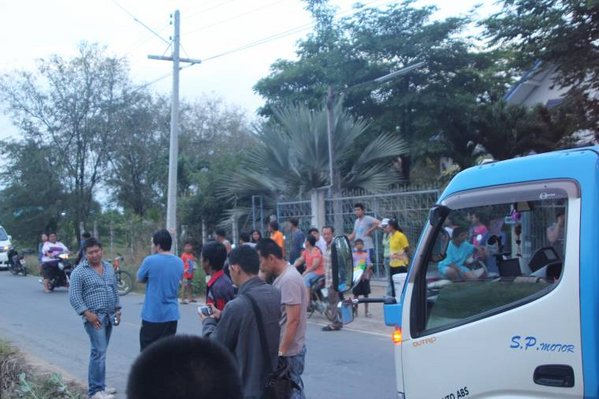 Tow trucks and onlookers.jpg