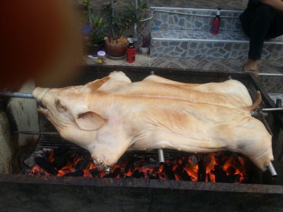 Piggy being roasted (408 x 306).jpg