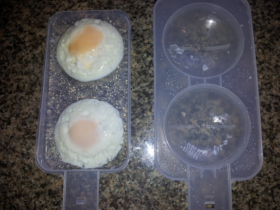 Big Boy's breakfast is ready to be served.  2 poached eggs cooked to his personal liking are ready to be slid onto his toast.